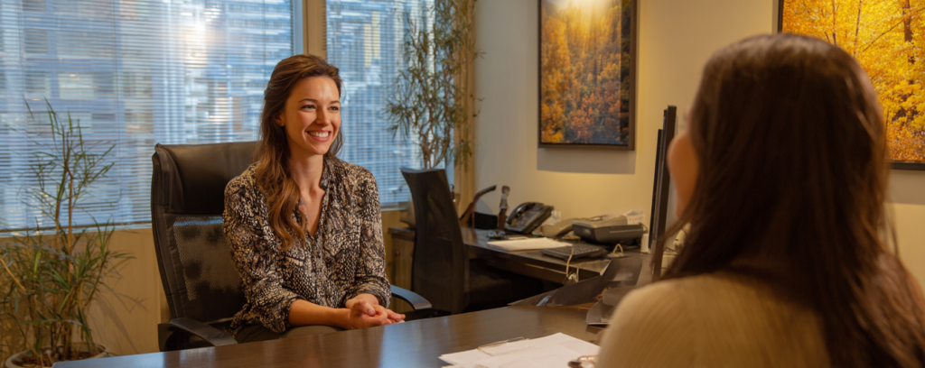 therapist sitting in office with patient